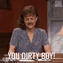 Woman With Mustache Saying You Dirty Boy GIF