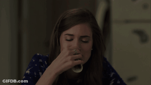 Woman With Napkin In Mouth GIF