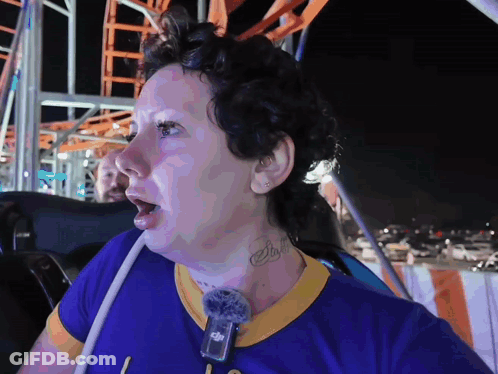 Woman With Neck Tattoo Riding Rollercoaster GIF