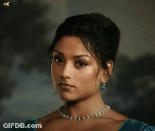 Woman With Necklace And Earrings And Bee GIF