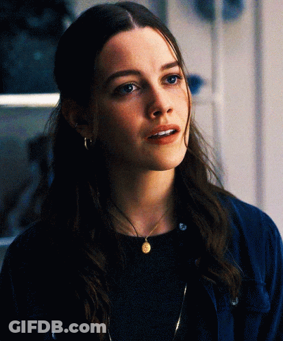 Woman With Necklace And Earrings GIF