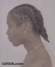 Woman With Necklace And Earrings Standing GIF