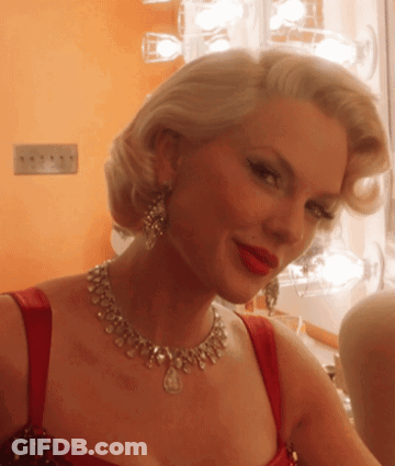 Woman With Necklace And Red Lipstick GIF