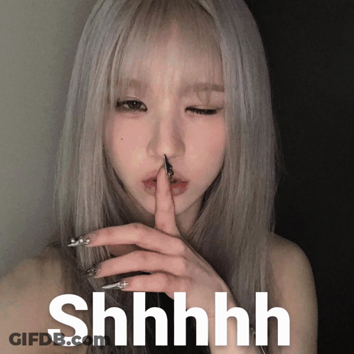 Woman With Needle In Nose Saying Shhh GIF