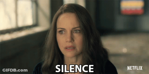 Woman With Netflix Logo Behind Her GIF
