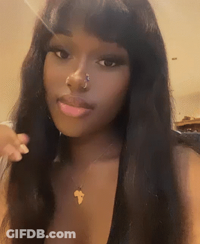 Woman With Nose Ring And Africa Map Necklace GIF