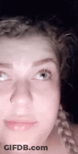 Woman With Nose Ring And Braids GIF