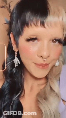 Woman With Nose Ring And Earrings GIF