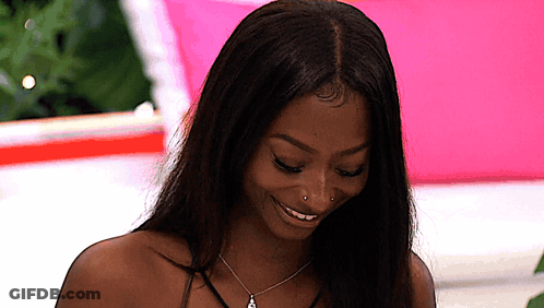 Woman With Nose Ring And Necklace Smiling GIF