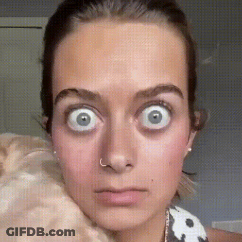 Woman With Nose Ring Funny Face Eyes Wide Open GIF