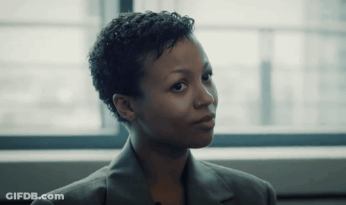 Woman With Nose Ring In Grey Jacket GIF