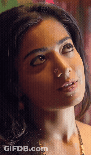 Woman With Nose Ring Looking Up GIF