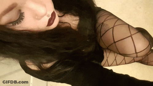 Woman With Nose Ring, Red Lipstick, Fishnets GIF