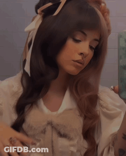 Woman With Nose Ring Taking Selfie GIF