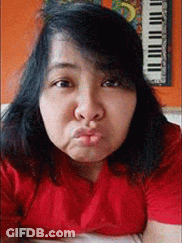 Woman With Open Mouth And Earrings GIF