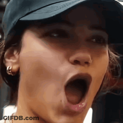 Woman With Open Mouth And Hat GIF