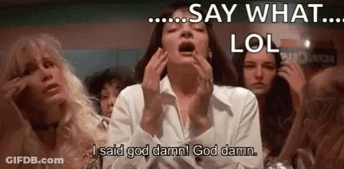 Woman With Open Mouth Sitting At Table With Group Of Women GIF