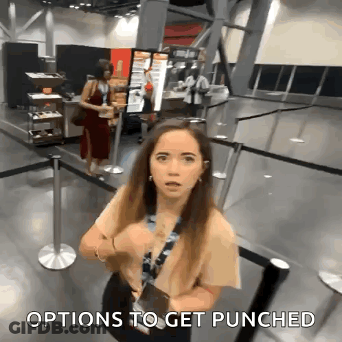 Woman With Options To Get Punched GIF