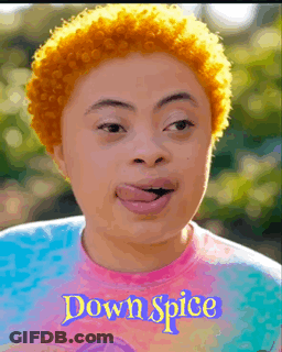 Woman With Orange Hair Wearing Tie Dye Shirt Saying Down Spice GIF