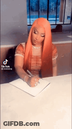 Woman With Orange Hair Writing GIF