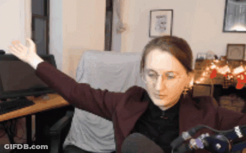 Woman With Outstretched Arms And Rode GIF