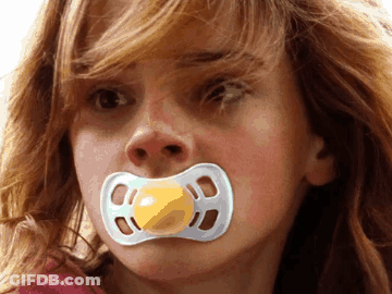 Woman With Pacifier Looking At Camera GIF