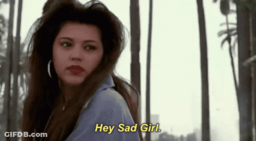 Woman With Palm Trees Saying Hey Sad Girl GIF