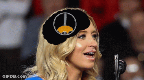 Woman With Peace Sign Singing Into Microphone GIF