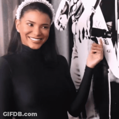 Woman With Pearl Headband Smiling GIF
