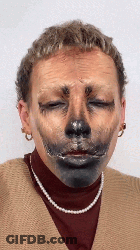 Woman With Pearl Necklace And Earrings Eyes Closed GIF