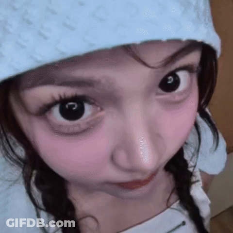 Woman With Pigtails And Hat GIF