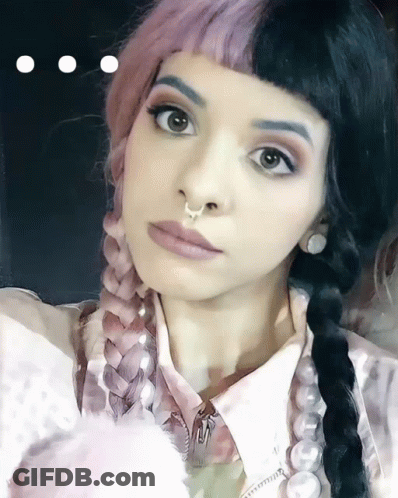 Woman With Pigtails And Nose Ring GIF