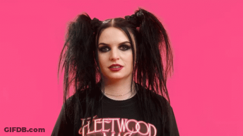 Woman With Pigtails In Fleetwood Mac Shirt GIF