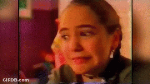 Woman With Pigtails Making Funny Face In Advertisement GIF
