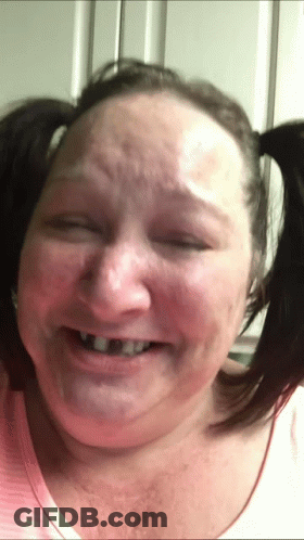Woman With Pigtails Smiling GIF
