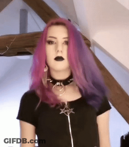 Woman With Pink And Purple Hair In Black Choker And Shirt GIF