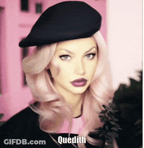Woman With Pink Hair And Black Hat Saying Quedith GIF