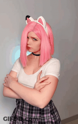 Woman With Pink Hair And Cat Ears Looks Angry GIF