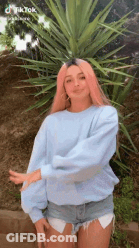 Woman With Pink Hair Dancing GIF