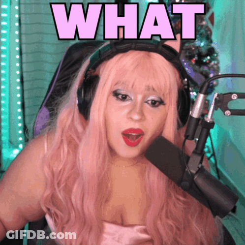 Woman With Pink Hair Holding Microphone GIF