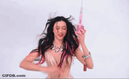 Woman With Pink Hair Holding Pink Microphone GIF