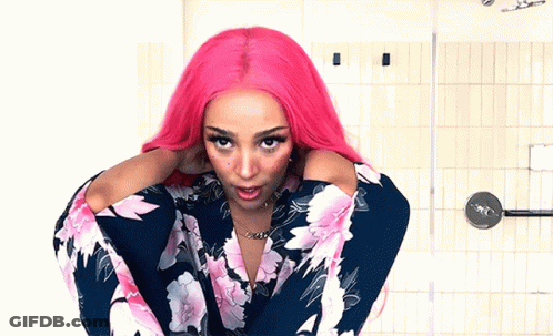 Woman With Pink Hair In Floral Dress GIF