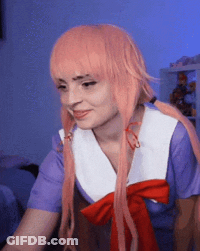 Woman With Pink Hair In Purple And White Shirt GIF