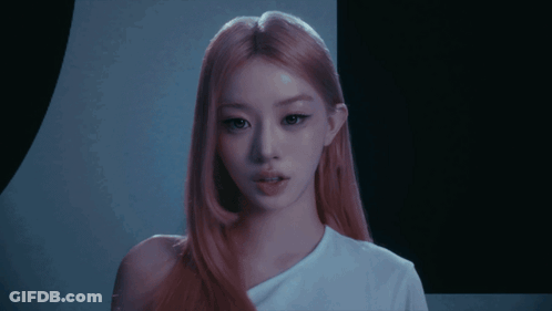 Woman With Pink Hair In White Shirt With Letter A GIF