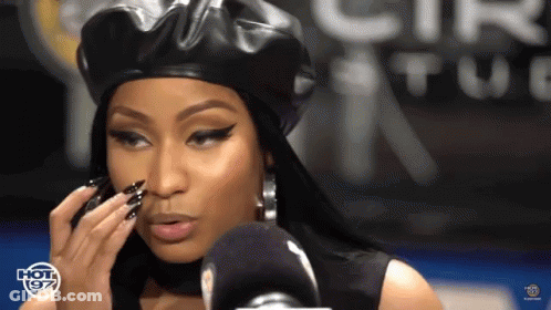 Woman With Pink Hair Making Funny Face GIF