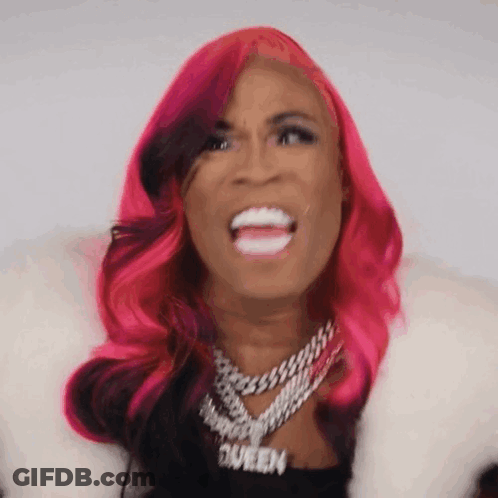 Woman With Pink Hair Making Funny Face GIF
