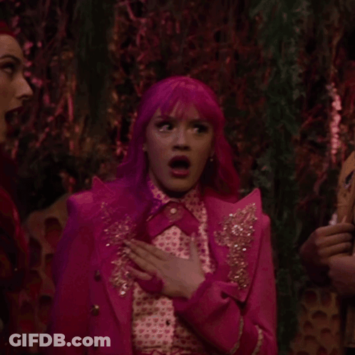 Woman With Pink Hair Next To Another Woman GIF