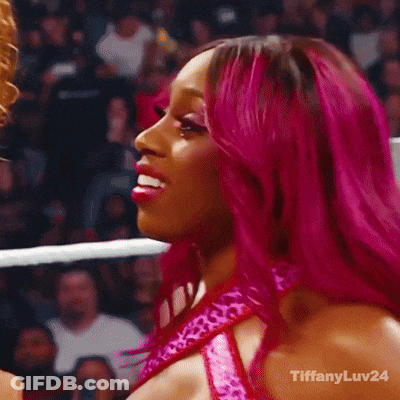 Woman With Pink Hair Smiling Holding Wrestling Championship Belt GIF