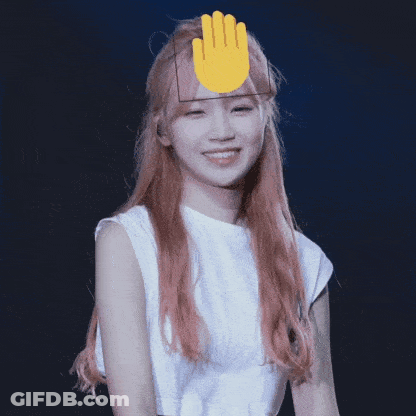 Woman With Pink Hair Smiling With Yellow Hand GIF