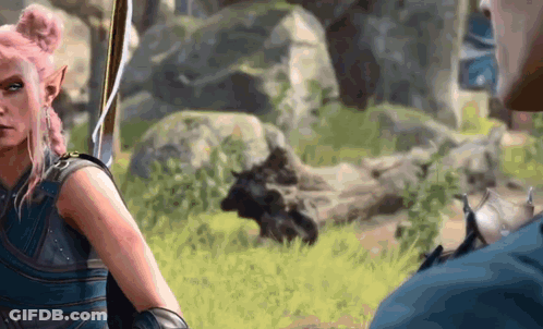 Woman With Pink Hair Standing Next To Man Holding Bow And Arrow GIF